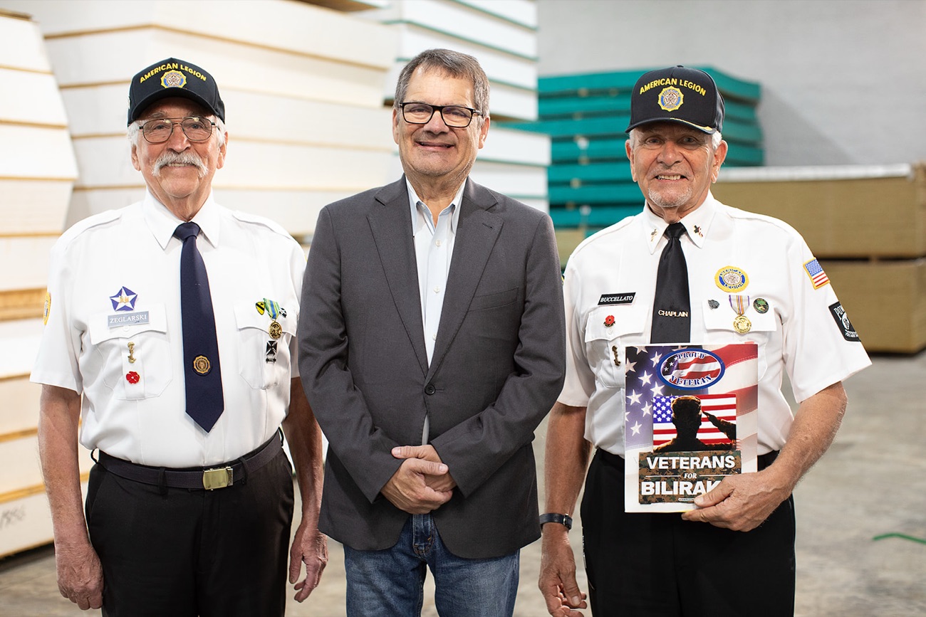 Gus Bilirakis with American Legion veterans holding a Veterans for Bilirakis sign